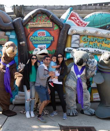 People posing with Character Ambassadors