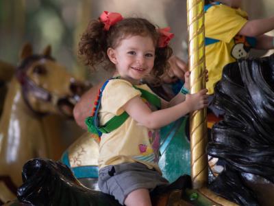 child on Grand Carousel