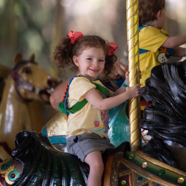 child on Grand Carousel